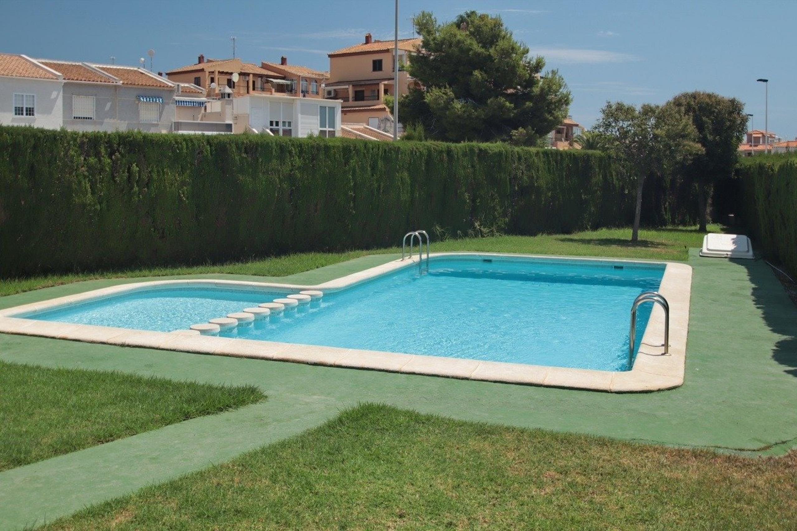 Maison de ville avec 3 chambres à coucher, 2 salons et 2 salles de bain à Torreblanca