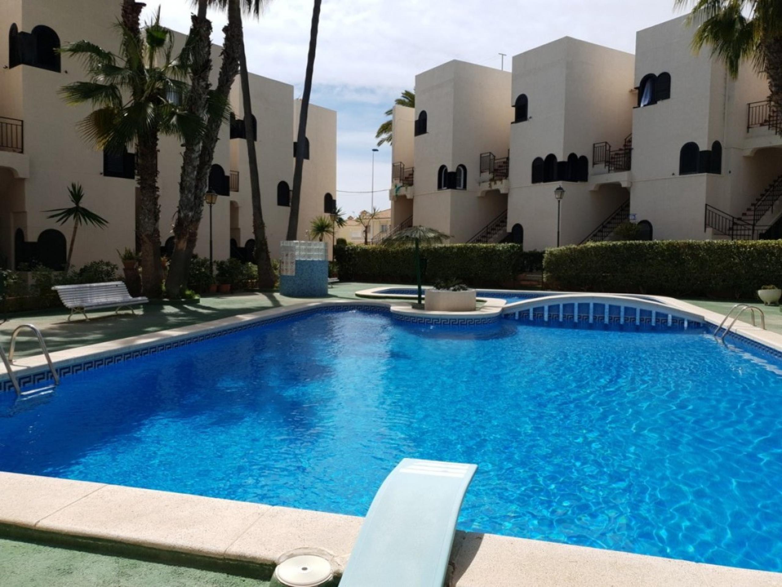 Appartement à Torre del Moro avec vue sur la piscine et la mer