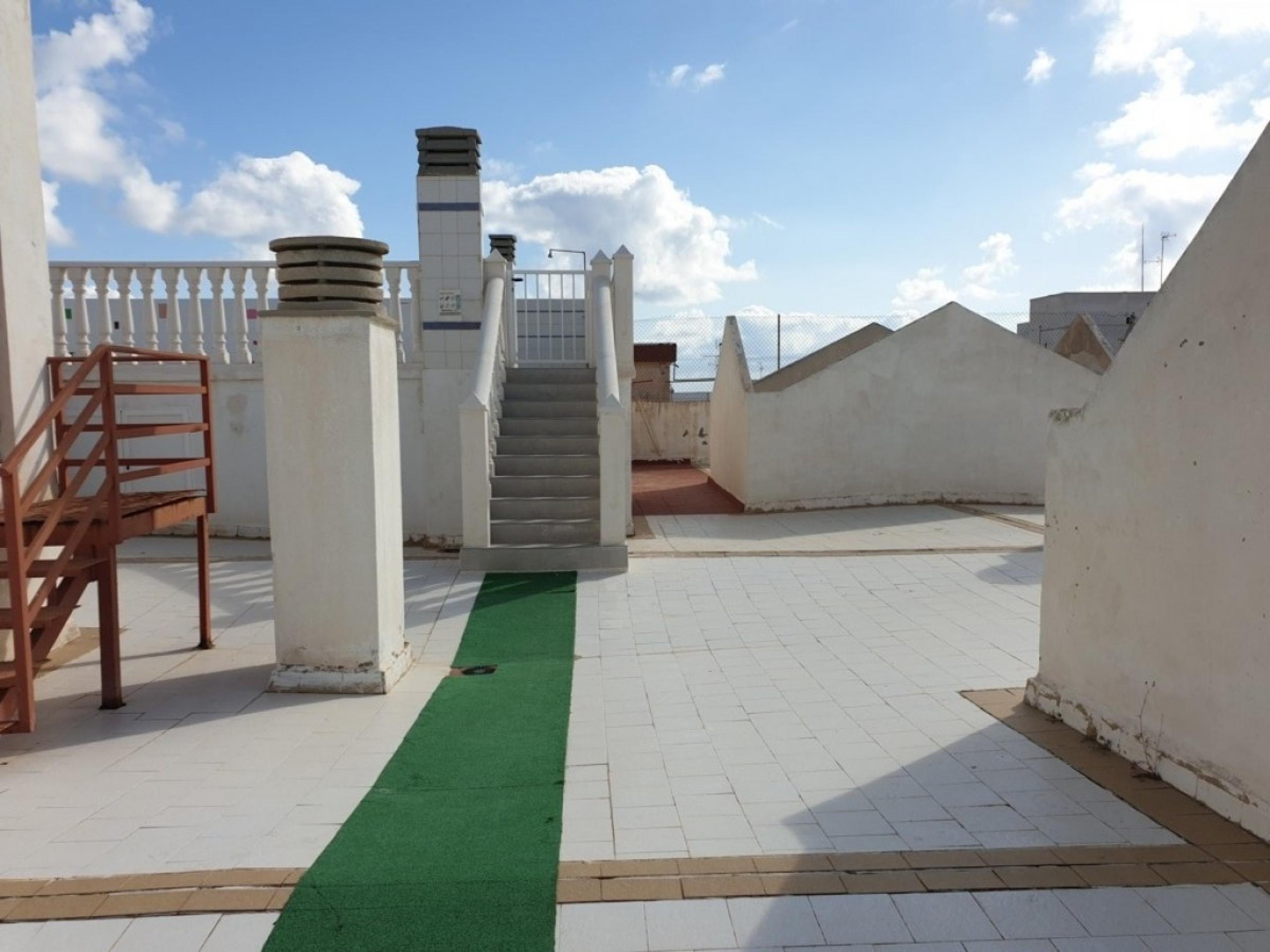 Appartement à côté de la plage de Cura, Piscine communautaire